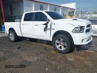 2014 Ram 1500 Sport with VIN 1C6RR7UT2ES443487, listed as a IAAI auction lot 42252962 with 161,881 mi miles and . Bid and sale history available at DreamBid. Image 1.