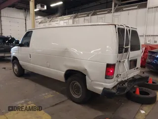 2011 Ford Econoline Cargo Commercial with VIN 1FTNE1EW5BDB01167, listed as a IAAI auction lot 41226859 with 248,606 mi miles and . Bid and sale history available at DreamBid. Image 3.