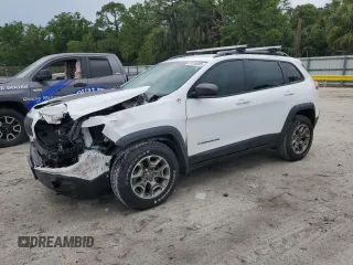 2020 Jeep Cherokee Trailhawk z VIN 1C4PJMBNXLD534857, wystawiony jako Copart lot #49155965 z przebiegiem 71 472 mil mil oraz Szkoda całkowita • Salvage title. Historia ofert i sprzedaży dostępna na DreamBid. Obrazek 1.