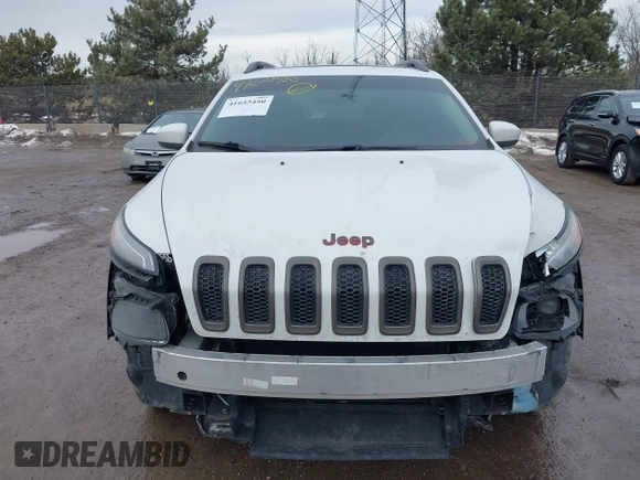 2016 Jeep Cherokee Latitude with VIN 1C4PJMCB7GW268714, listed as a IAAI auction lot 41655450 with 180,603 mi miles. Bid and sale history available at carsss.com. Image 13.