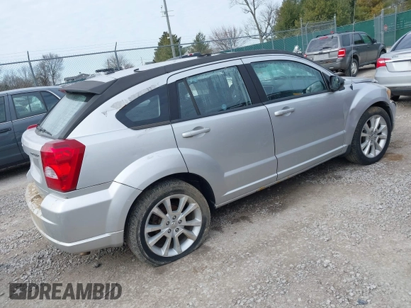 2011 Dodge Caliber Heat with VIN 1B3CB5HA0BD237473, listed as a IAAI auction lot 41690622 with 205,961 mi miles and . Bid and sale history available at DreamBid. Image 4.