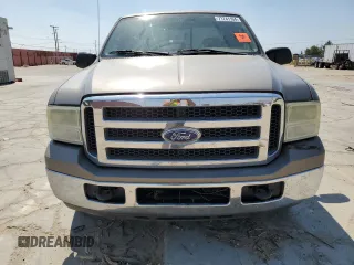 2005 Ford Super Duty F-250 XL with VIN 1FTSX205X5EA72216, listed as a Copart auction lot 71741104 with 217,205 mi miles and Salvage Title. Bid and sale history available at carsss.com. Image 5.
