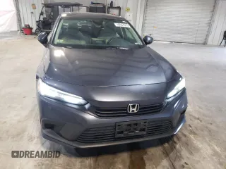 2023 Honda Civic Sedan EX with VIN 2HGFE1F71PH313006, listed as a Copart auction lot 48667815 with 32,942 mi miles and Salvage Title. Bid and sale history available at carsss.com. Image 5.