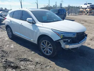 2020 Acura RDX w/Technology Pkg with VIN 5J8TC1H52LL006185, listed as a IAAI auction lot 41457828 with 59,998 mi miles. Bid and sale history available at carsss.com. Image 1.