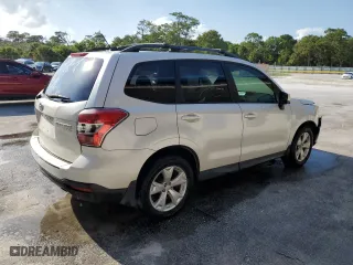 2014 Subaru Forester 2.5i Premium with VIN JF2SJADCXEH473754, listed as a Copart auction lot 51122765 with 165,839 mi miles and Salvage Title. Bid and sale history available at carsss.com. Image 3.