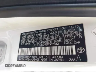 2014 Toyota Yaris L with VIN JTDKTUD34ED589582, listed as a IAAI auction lot 41538884 with 87,798 mi miles. Bid and sale history available at carsss.com. Image 9.
