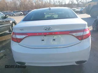 2014 Hyundai Azera with VIN KMHFG4JG6EA354949, listed as a IAAI auction lot 41034372 with 173,338 mi miles and . Bid and sale history available at DreamBid. Image 16.