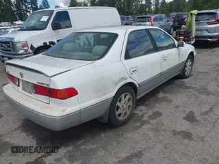 2001 Toyota Camry LE z VIN JT2BF22K310304712, wystawiony jako IAAI lot #42386743 z przebiegiem 103 552 mil mil oraz . Historia ofert i sprzedaży dostępna na DreamBid. Obrazek 4.