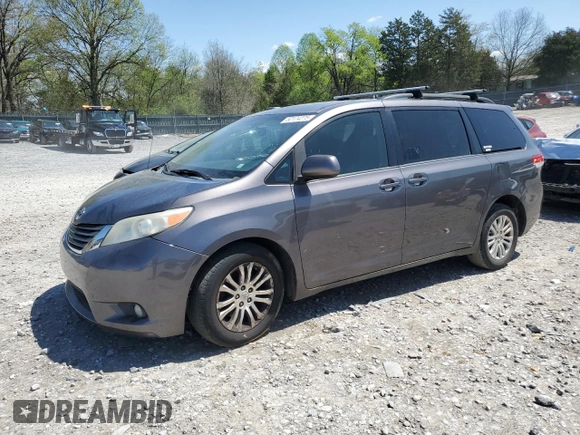 2013 Toyota Sienna XLE AAS with VIN 5TDYK3DC2DS372879, listed as a Copart auction lot 52174275 with 213,923 mi miles and Clean Title. Bid and sale history available at carsss.com. Image 1.