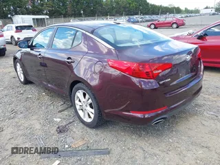 2012 Kia Optima LX with VIN 5XXGM4A77CG033361, listed as a IAAI auction lot 42210159 with 214,137 mi miles and . Bid and sale history available at carsss.com. Image 3.