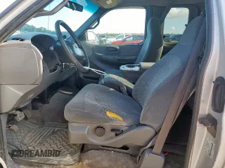2000 Ford F-150 XL с VIN 1FTRX17L6YKB45245, выставлен на аукционе Copart как лот 62365195 с пробегом 306 210 миль миль и Списание • Salvage title. История ставок и продаж доступна на DreamBid. Изображение 7.