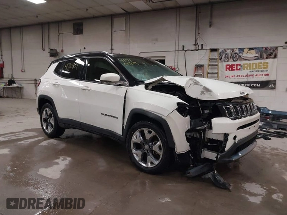 2021 Jeep Compass Limited with VIN 3C4NJCCB0MT576990, listed as a IAAI auction lot 41710809 with 77,903 mi miles. Bid and sale history available at carsss.com. Image 1.