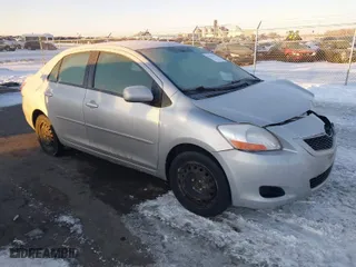2010 Toyota Yaris with VIN JTDBT4K38A4076168, listed as a IAAI auction lot 41635379 with 156,016 mi miles. Bid and sale history available at carsss.com. Image 1.