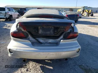 2002 Pontiac Sunfire z VIN 1G2JD12T627123970, wystawiony jako Copart lot #73338004 z przebiegiem 175 688 mil mil oraz Nie do naprawy. Historia ofert i sprzedaży dostępna na DreamBid. Obrazek 6.