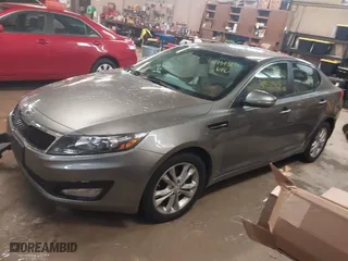 2012 Kia Optima LX with VIN 5XXGM4A73CG069032, listed as a IAAI auction lot 41939325 with 107,808 mi miles. Bid and sale history available at carsss.com. Image 2.