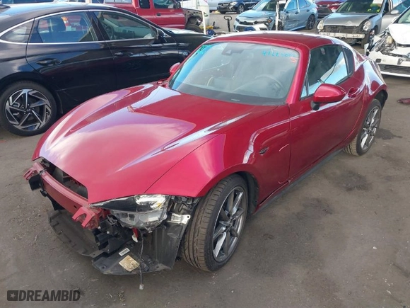 2023 Mazda MX-5 Miata RF Grand Touring with VIN JM1NDAM78P0551083, listed as a IAAI auction lot 41229002 with 10,152 mi miles. Bid and sale history available at carsss.com. Image 2.