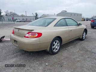 2002 Toyota Solara SE with VIN 2T1CF28P82C595679, listed as a IAAI auction lot 42010315 with 103,986 mi miles. Bid and sale history available at carsss.com. Image 4.