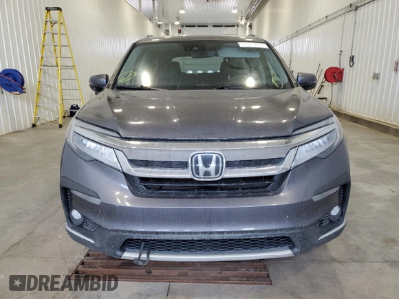 2019 Honda Pilot Touring 8-Passenger z VIN 5FNYF6H93KB502528, wystawiony jako Copart lot #51811045 z przebiegiem 157 204 mil mil oraz Czysty tytuł • Clean title. Historia ofert i sprzedaży dostępna na DreamBid. Obrazek 5.