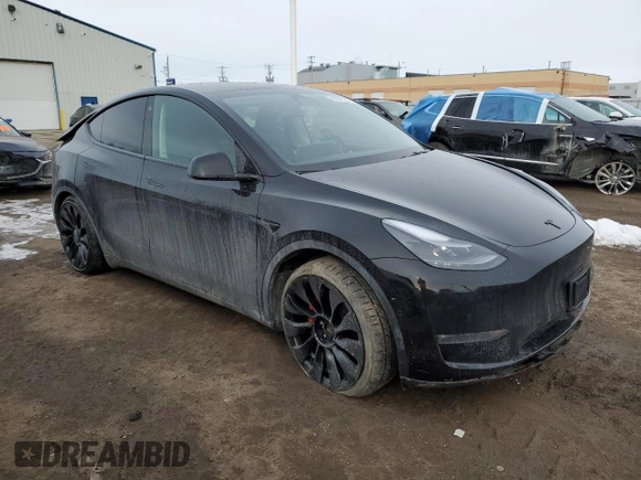 2022 Tesla Model Y Performance z VIN 7SAYGDEF5NF512464, wystawiony jako Copart lot #46337165 z przebiegiem 74 761 mil mil oraz Szkoda całkowita • Salvage title. Historia ofert i sprzedaży dostępna na DreamBid. Obrazek 4.
