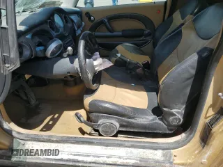 2004 MINI Hardtop z VIN WMWRC33454TC50742, wystawiony jako Copart lot #56655565 z przebiegiem Nie podano mil oraz Szkoda całkowita • Salvage title. Historia ofert i sprzedaży dostępna na DreamBid. Obrazek 7.