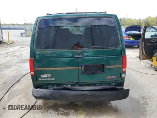 1998 GMC Safari z VIN 1GDDM19WXWB540497, wystawiony jako Copart lot #50780655 z przebiegiem 115 575 mil mil oraz Nie do naprawy. Historia ofert i sprzedaży dostępna na DreamBid. Obrazek 6.