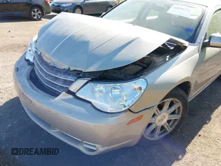 2009 Chrysler Sebring Limited z VIN 1C3LC56V29N561843, wystawiony jako IAAI lot #42286794 z przebiegiem 60 182 mil mil oraz . Historia ofert i sprzedaży dostępna na DreamBid. Obrazek 19.