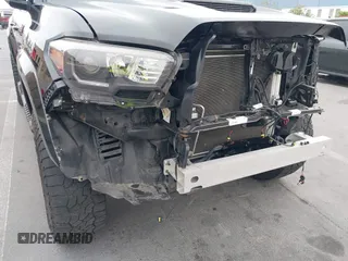 2022 Toyota Tacoma SR5 with VIN 3TMAZ5CN6NM183150, listed as a IAAI auction lot 42563528 with 38,726 mi miles and . Bid and sale history available at DreamBid. Image 20.