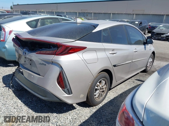 2021 Toyota Prius LE with VIN JTDKAMFP5M3167430, listed as a IAAI auction lot 42462853 with 70,492 mi miles and . Bid and sale history available at DreamBid. Image 4.