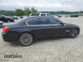 2011 BMW 7 Series 740Li with VIN WBAKB4C57BC574689, listed as a Copart auction lot 54701195 with 135,878 mi miles and Clean Title. Bid and sale history available at carsss.com. Image 3.