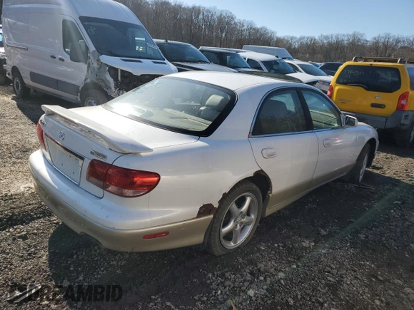2002 Mazda Millenia S z VIN JM1TA222521733260, wystawiony jako Copart lot #49984755 z przebiegiem 140 212 mil mil oraz Szkoda całkowita • Salvage title. Historia ofert i sprzedaży dostępna na DreamBid. Obrazek 3.