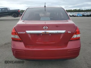 2010 Nissan Versa 1.8 S with VIN 3N1BC1AP4AL371722, listed as a Copart auction lot 72641144 with 128,445 mi miles and Salvage Title. Bid and sale history available at carsss.com. Image 6.