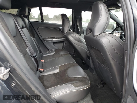 2015 Volvo V60 z VIN YV1902SS6F1227756, wystawiony jako Copart lot #57962725 z przebiegiem 62 542 mil mil oraz Szkoda całkowita • Salvage title. Historia ofert i sprzedaży dostępna na DreamBid. Obrazek 10.
