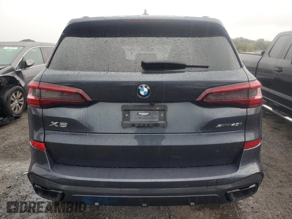 2022 BMW X5 xDrive40i with VIN 5UXCR6C03N9K58192, listed as a Copart auction lot 74526984 with Not Provided miles and Salvage Title. Bid and sale history available at DreamBid. Image 6.