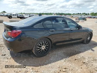 2013 BMW 7 Series 750i with VIN WBAYA8C5XDC996785, listed as a Copart auction lot 54854165 with 134,472 mi miles and Clean Title. Bid and sale history available at carsss.com. Image 3.