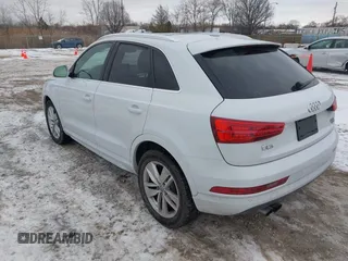 2017 Audi Q3 Premium Plus z VIN WA1JCCFS6HR008921, wystawiony jako IAAI lot #41351675 z przebiegiem 117 158 mil mil oraz . Historia ofert i sprzedaży dostępna na DreamBid. Obrazek 3.