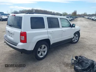 2014 Jeep Patriot Sport with VIN 1C4NJRBB5ED778512, listed as a IAAI auction lot 42172300 with 118,934 mi miles and . Bid and sale history available at carsss.com. Image 4.