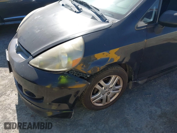 2007 Honda Fit Sport z VIN JHMGD37617S004845, wystawiony jako IAAI lot #42401148 z przebiegiem 212 566 mil mil oraz . Historia ofert i sprzedaży dostępna na DreamBid. Obrazek 13.