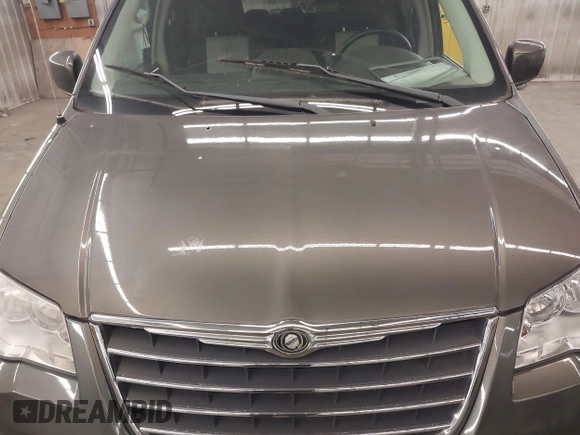 2010 Chrysler Town & Country Touring Plus with VIN 2A4RR8D17AR393916, listed as a IAAI auction lot 42171114 with 123,741 mi miles. Bid and sale history available at carsss.com. Image 6.