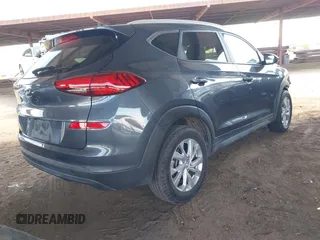 2021 Hyundai Tucson Value with VIN KM8J33A44MU403018, listed as a IAAI auction lot 42074597 with 63,654 mi miles and . Bid and sale history available at DreamBid. Image 4.