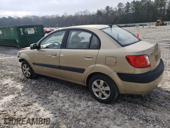 2009 Kia Rio LX with VIN KNADE223296470687, listed as a Copart auction lot 48385925 with 176,400 mi miles and Salvage Title. Bid and sale history available at DreamBid. Image 2.