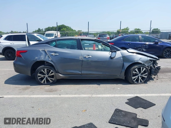 2017 Nissan Maxima S with VIN 1N4AA6AP3HC416012, listed as a IAAI auction lot 42390026 with 105,921 mi miles and . Bid and sale history available at DreamBid. Image 13.