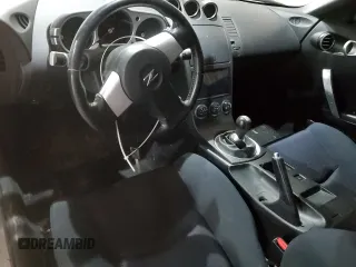 2005 Nissan 350Z Enthusiast z VIN JN1AZ34D85M606500, wystawiony jako Copart lot #83620344 z przebiegiem Nie podano mil oraz Szkoda całkowita • Salvage title. Historia ofert i sprzedaży dostępna na DreamBid. Obrazek 8.