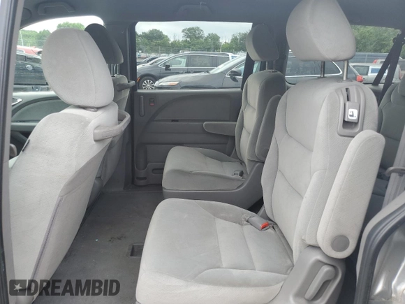2010 Honda Odyssey LX with VIN 5FNRL3H2XAB059078, listed as a Copart auction lot 61144895 with 116,724 mi miles and Salvage title. Bid and sale history available at DreamBid. Image 10.