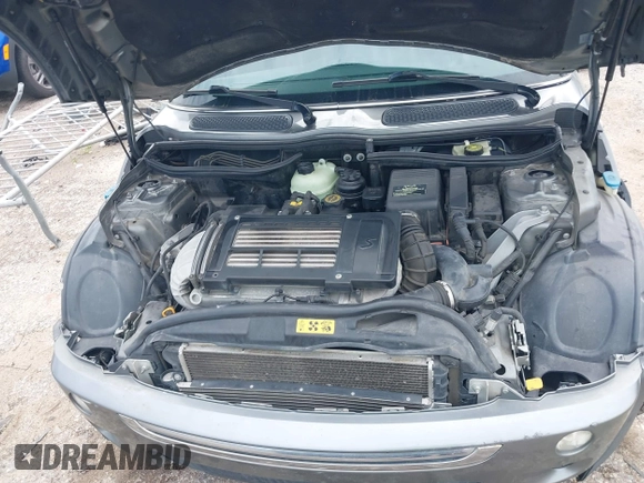 2006 MINI Convertible S with VIN WMWRH33586TF87791, listed as a IAAI auction lot 42679478 with 90,209 mi miles and . Bid and sale history available at DreamBid. Image 10.