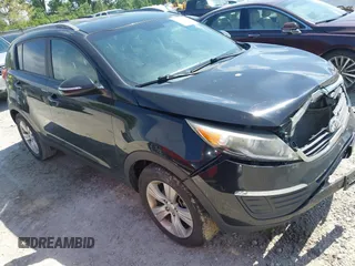 2013 Kia Sportage LX z VIN KNDPB3A26D7517696, wystawiony jako IAAI lot #42298808 z przebiegiem 189 442 mil mil oraz . Historia ofert i sprzedaży dostępna na DreamBid. Obrazek 1.