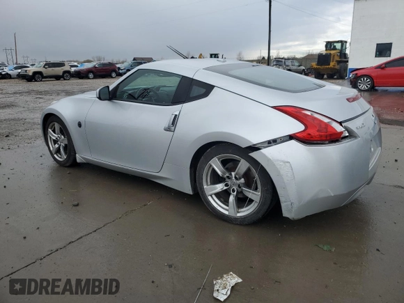 2009 Nissan 370Z Touring with VIN JN1AZ44E89M409220, listed as a Copart auction lot 43701504 with 145,099 mi miles and Salvage Title. Bid and sale history available at carsss.com. Image 2.