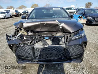 2019 Toyota Avalon Limited Hybrid z VIN 4T1B21FBXKU003688, wystawiony jako Copart lot #69697502 z przebiegiem 48 950 mil mil oraz . Historia ofert i sprzedaży dostępna na DreamBid. Obrazek 5.