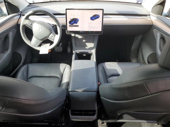 2023 Tesla Model Y Long Range with VIN 7SAYGDEE9PF606213, listed as a Copart auction lot 50940695 with 28,435 mi miles and Salvage Title. Bid and sale history available at carsss.com. Image 8.