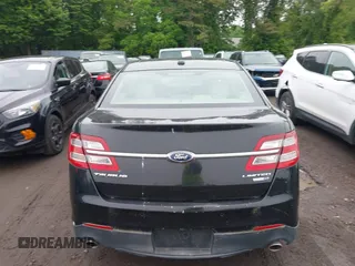 2014 Ford Taurus Limited z VIN 1FAHP2J8XEG112310, wystawiony jako IAAI lot #42367397 z przebiegiem 77 329 mil mil oraz . Historia ofert i sprzedaży dostępna na DreamBid. Obrazek 16.