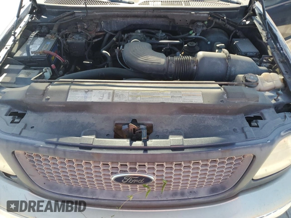 2000 Ford F-150 XL with VIN 1FTRX18L0YNB65908, listed as a Copart auction lot 54797585 with 298,924 mi miles and Clean title. Bid and sale history available at DreamBid. Image 11.